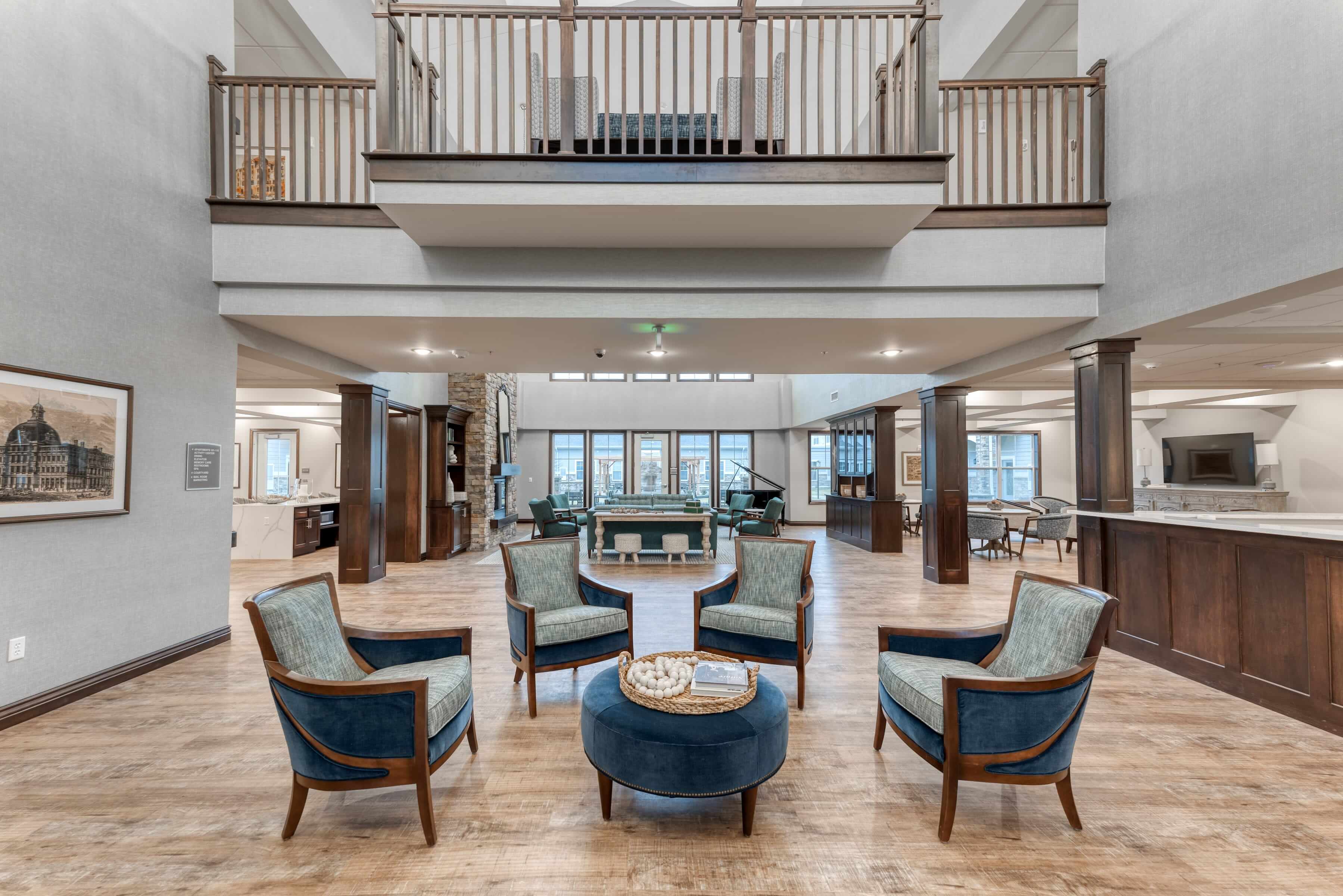 Light, airy community gathering space featuring comfortable but modern seating options