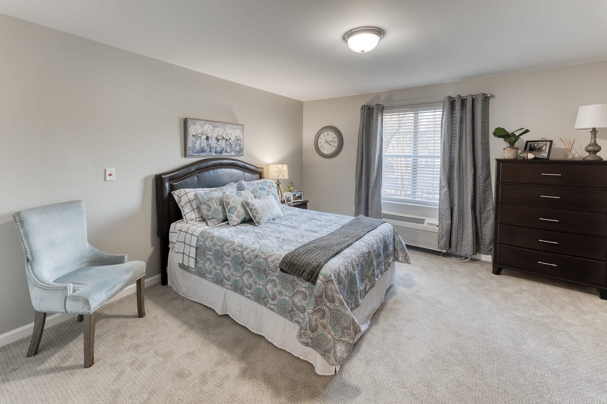 Classic designed bedroom with stud chair and bed